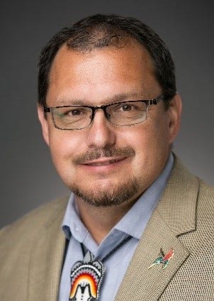 Headshot of Ernie Rasmussen. 