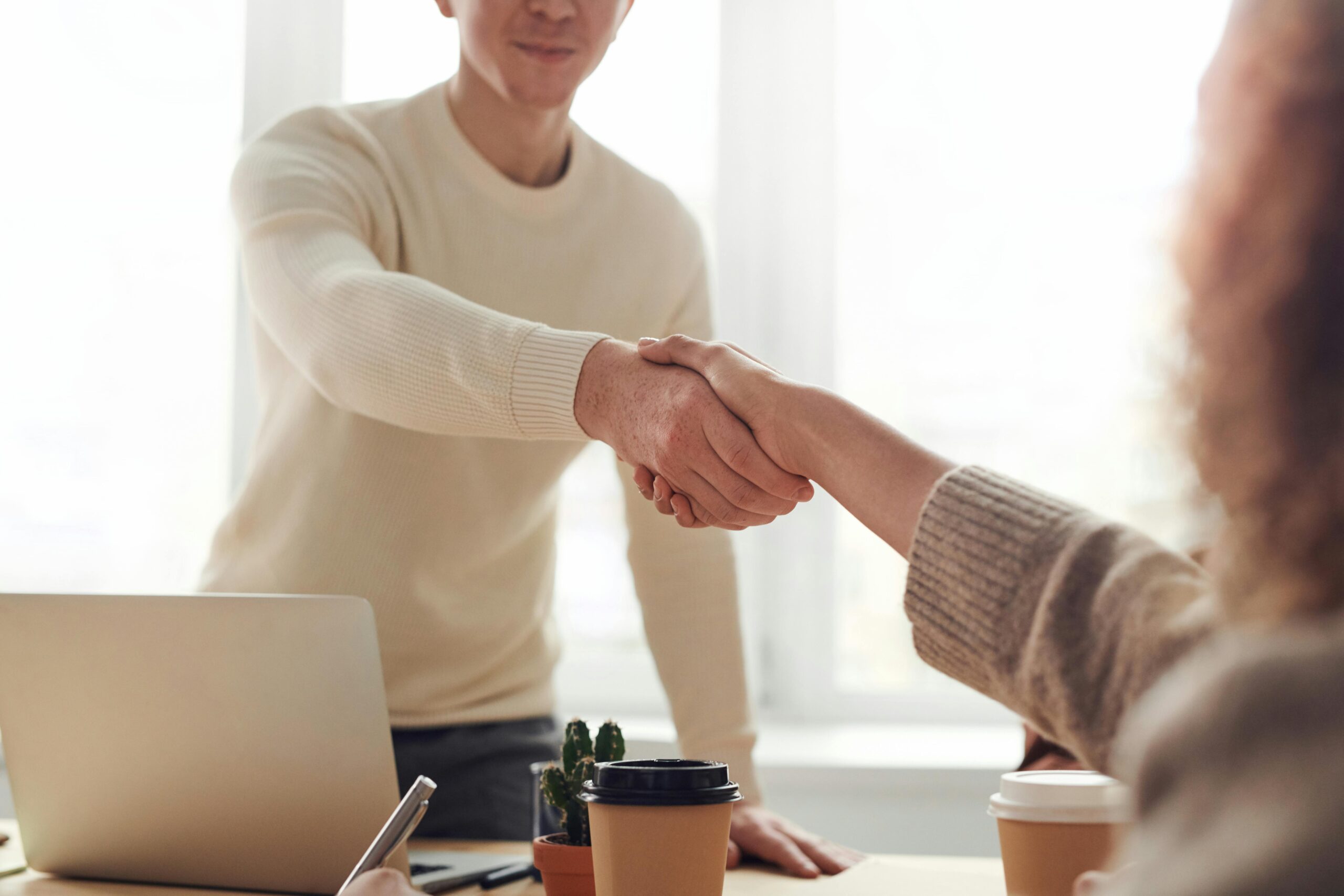 Jab candidate shaking hands