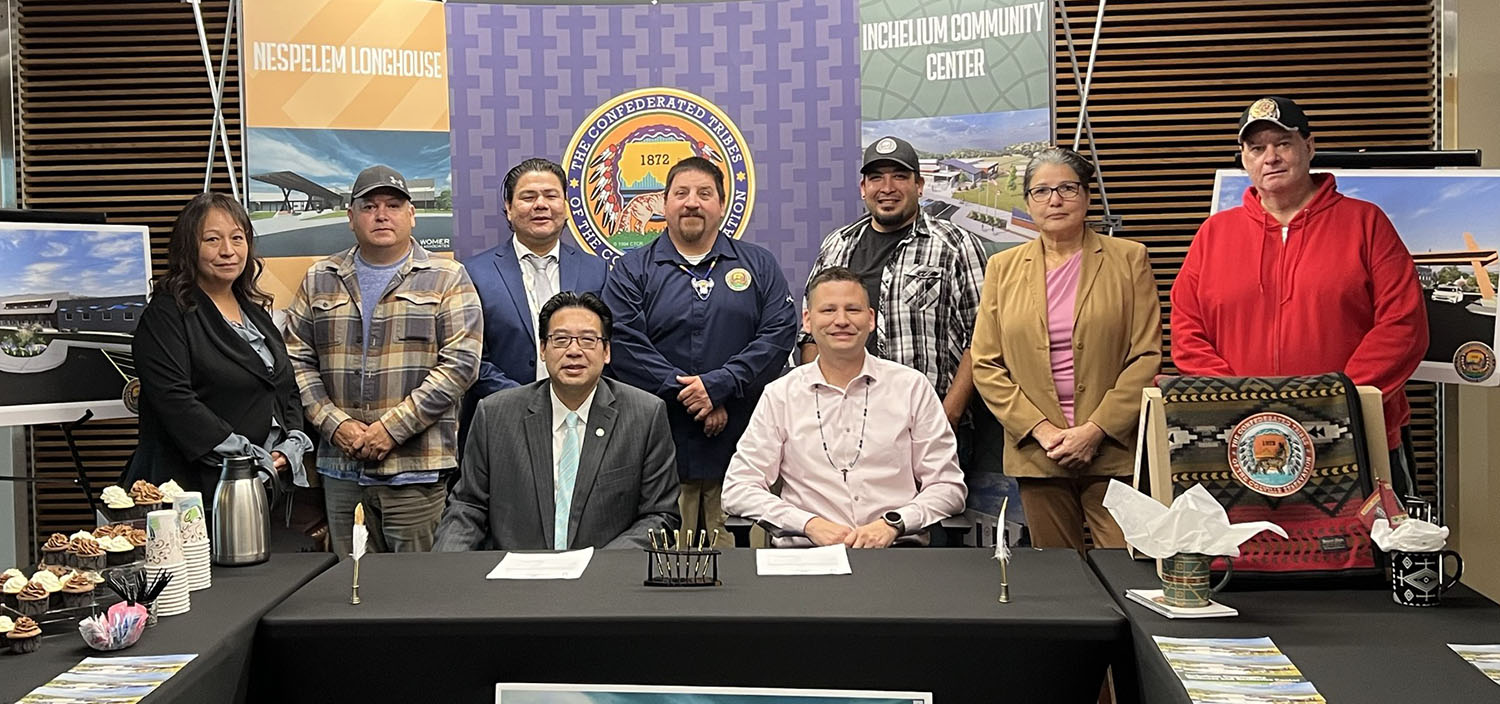 Seated: Commerce Director Fong and Confederated Tribes of the Colville Reservation Chairman Jarred-Michael Erickson. Back row, from left: Sharlene Zacherle, Nespelem District, Colville Business Council; Dustin Best, Omak District, Colville Business Council; Al Andy, Commerce Office of Tribal Relations; Roger Finley, Inchelium District, Colville Business Council; Steve Carson, Inchelium District, Colville Business Council; Norma Sanchez, Omak District, Colville Business Council; Kyle Etchison, Keller District, Colville Business Council